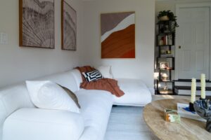 L Shaped White Sofa In Den